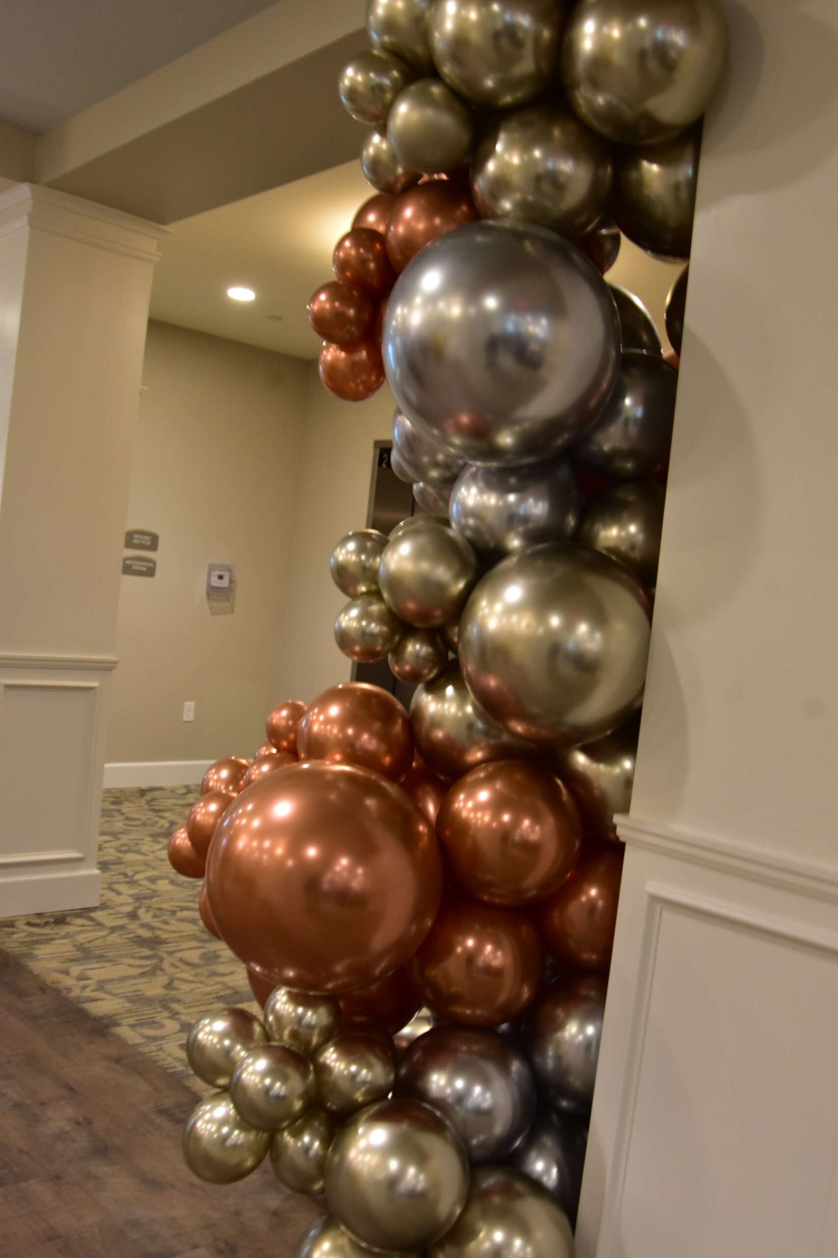 metallic balloons on a wall